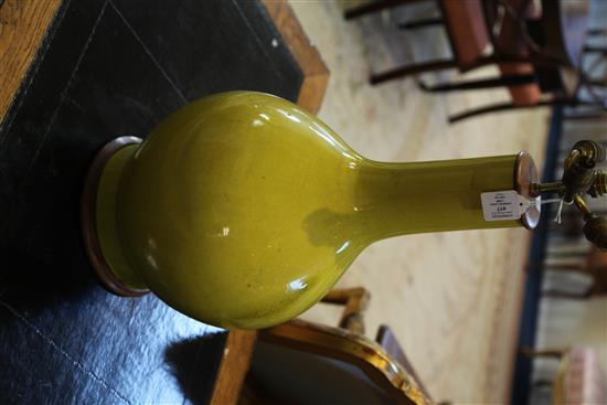 A large Chinese yellow crackle glaze bottle vase, early 20th century, 59cm incl. wooden top and base